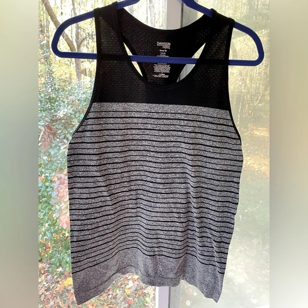 Danskin Now M(8-10) women’s racerback tank top. Loose fit “Dri Mor” black & gray